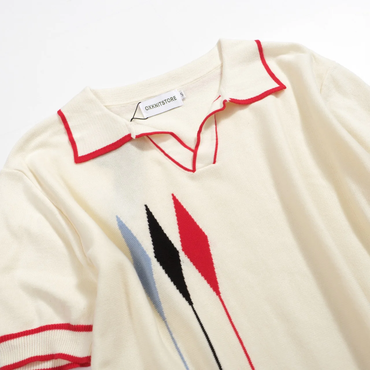 Men’s Vintage 1970s Knit Polo Shirt – Retro Cream with Red, Black & Blue Arrow Graphic - Image 8