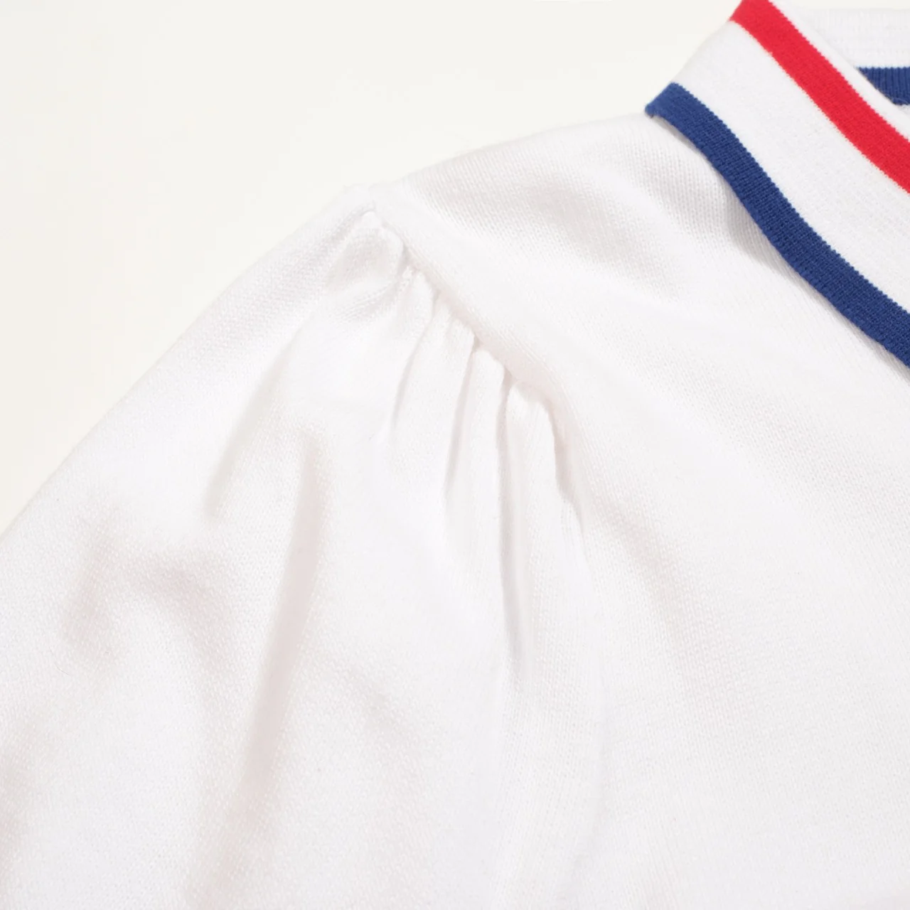 Women's white apricot striped design puffed sleeve knitted polo - Image 5